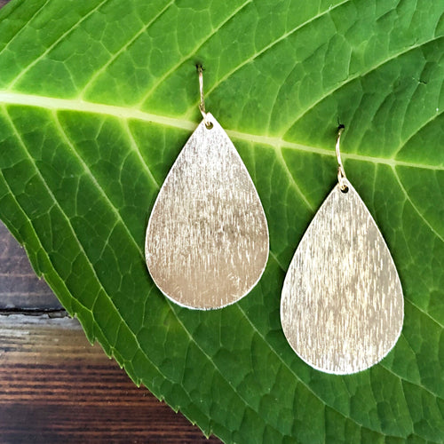 Gold tear earring